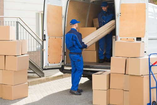 Packing boxes and moving supplies arranged for a Bayswater home move