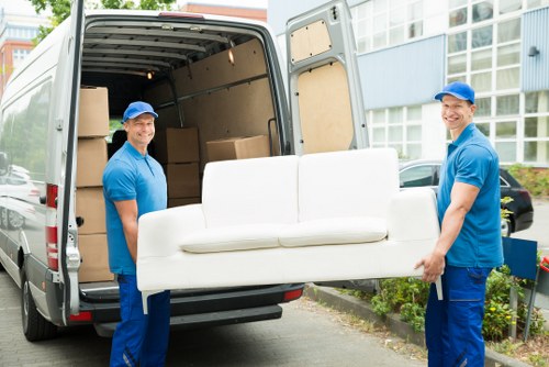 Professional house removalists in Bayswater loading furniture into a moving truck