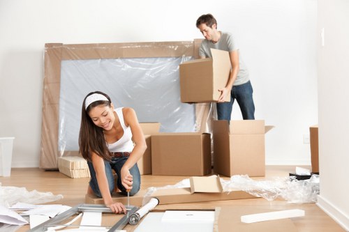 Furniture pick-up service removing a sofa in Bayswater