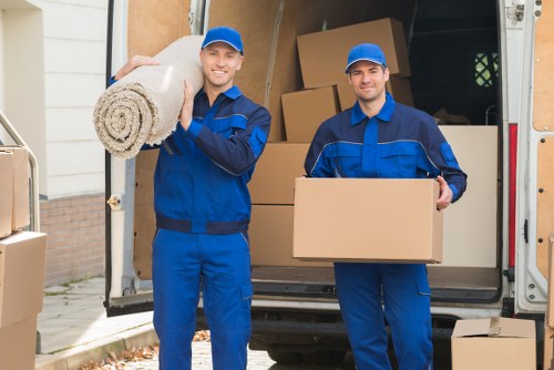 Students preparing for removals in Bayswater with packed boxes