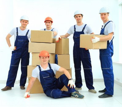 Removal team starting a safe moving task with equipment and planning