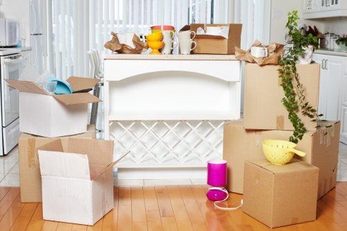 Professional movers loading furniture for a Bayswater house relocation