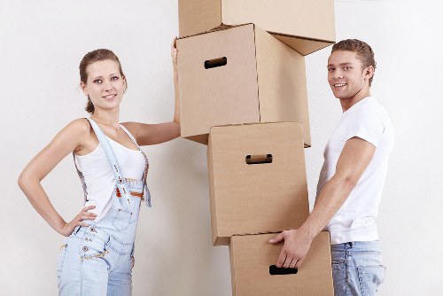 House movers preparing boxes and furniture for transport in Bayswater