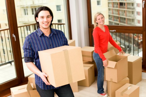 Moving boxes and furniture in a Bayswater flat relocation